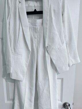DKNY linen-silk like white suit with sheer back and taper leg size 2